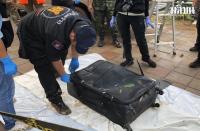 タイ東北部ナコーンパノム県のメコン川に浮いているスーツケースの中から女性の遺体を発見